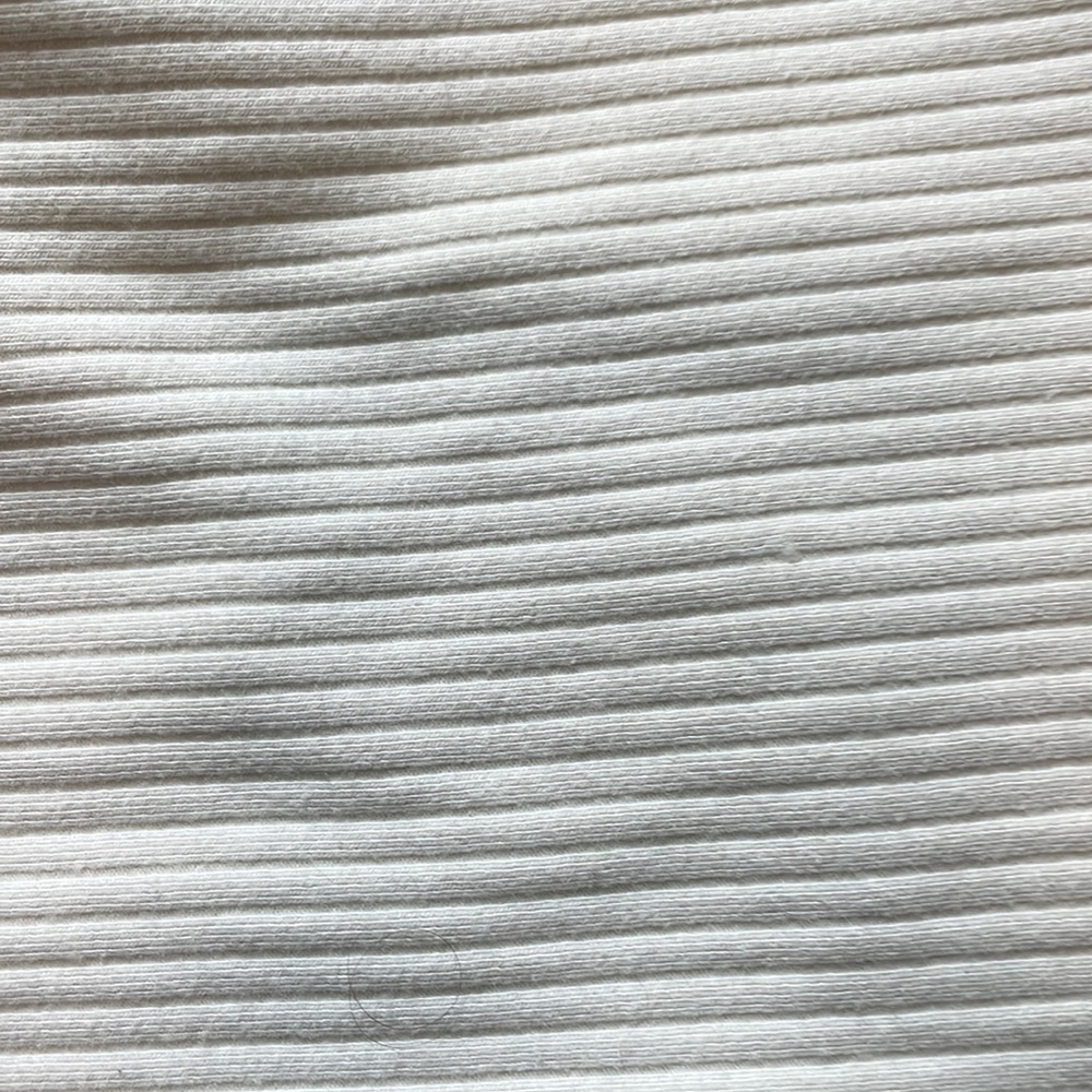 white ribbed flare pants.